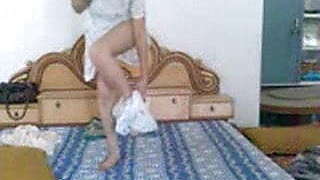 Punjabi Babe strips and masturbates while on phone