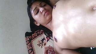 India girl getting an oily body massage