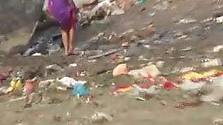 Bengali desi aunty washing mature ass in Public