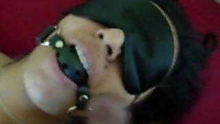 Blindfolded, ball gagged Indian slave takes facial cumshot