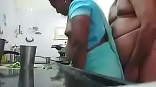 Desi couple in kitchen