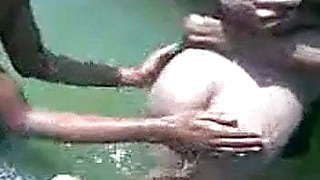 Indian girl in river with theri bfs